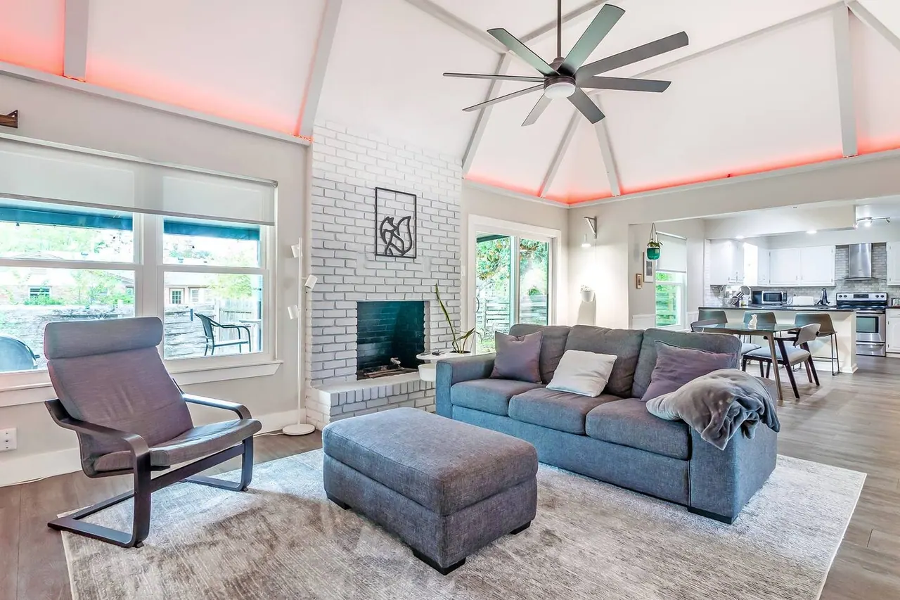 Light-filled living room at De Soto, a Hosted Havens home in Universal City